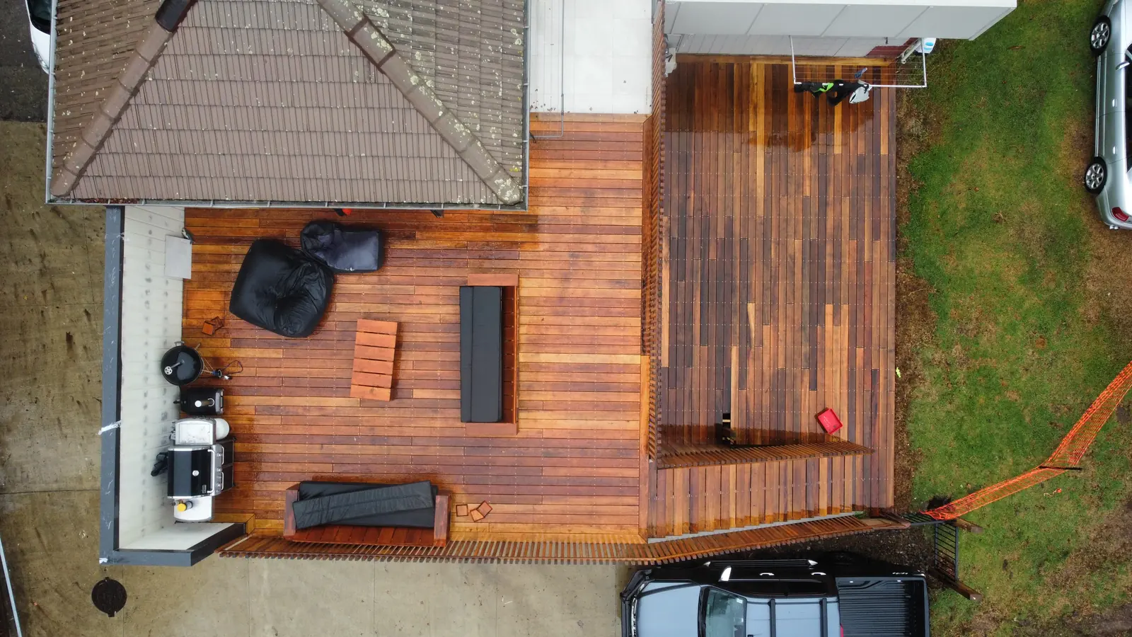 Aerial view of a timber deck beside a tile roof