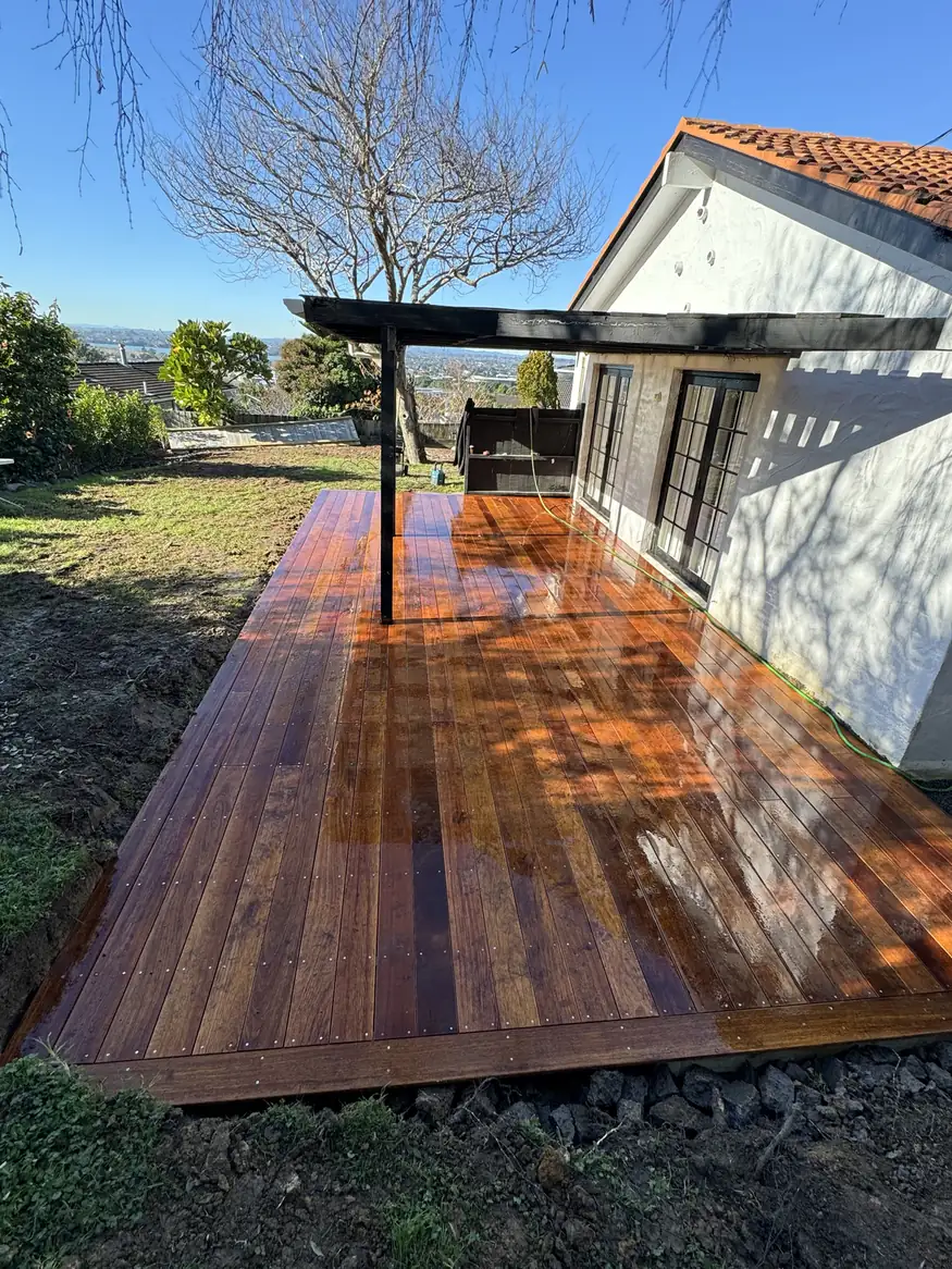 Merbau deck with a black pergola over it